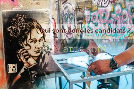 Urne électorale sur fond de graff avec des portraits et des clowns